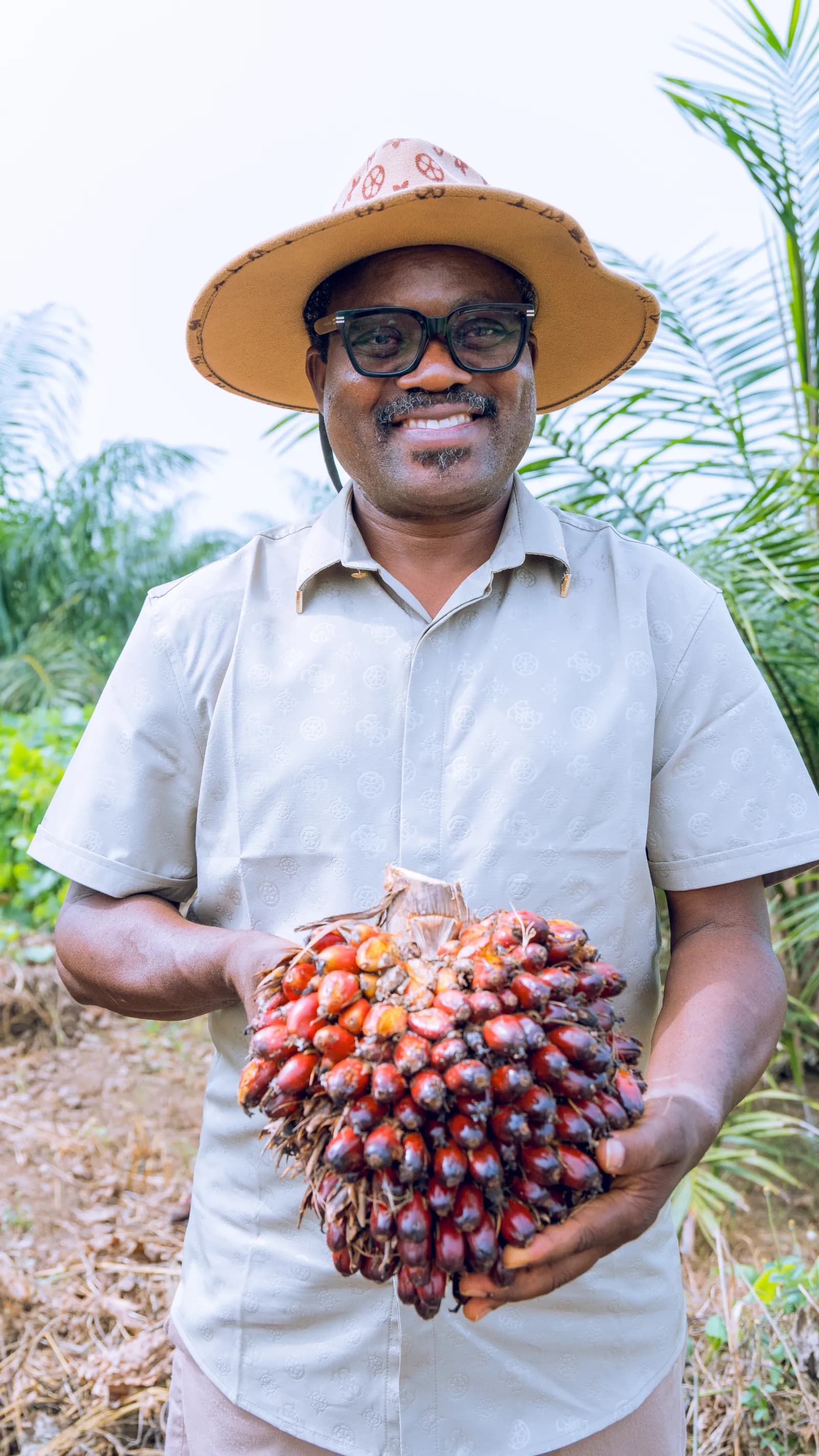 Dr. Awelewa in the field at JB Farms plantation