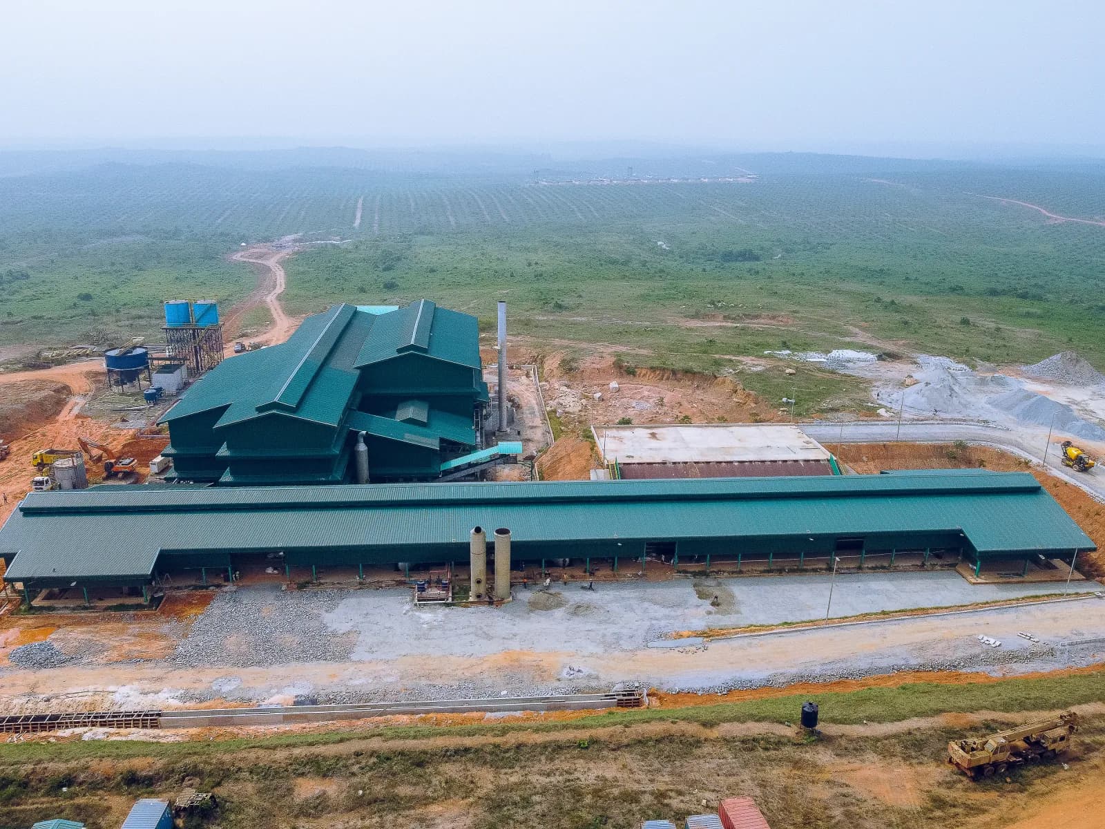 Aerial view of highway through JB Farms plantation in Ore